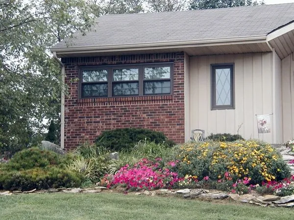White casement window on home