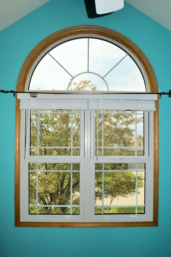 Double-hung window installation — large home